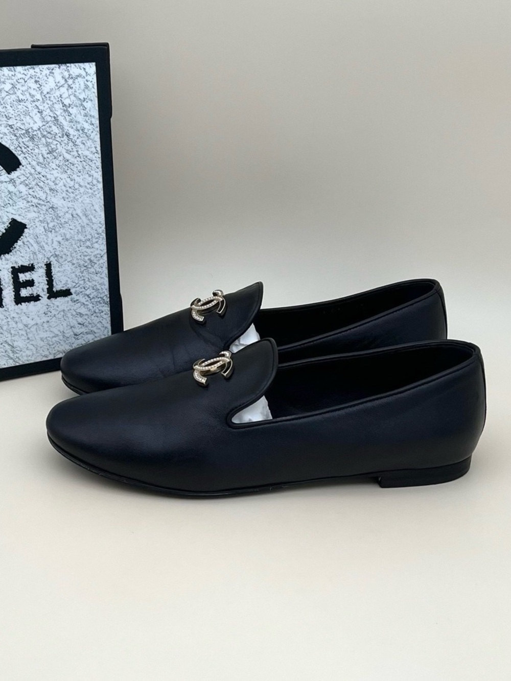 CHANEL Black Leather Slip-On Loafers with Silver CC Chain